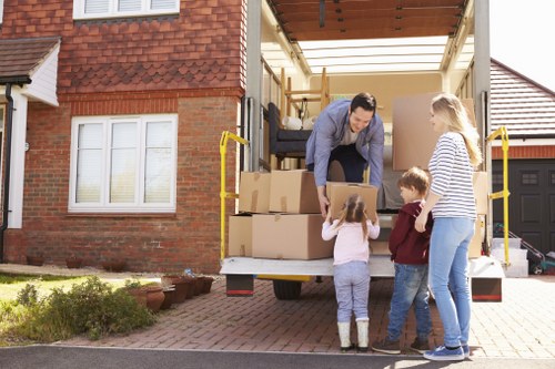 Careful wrapping of fragile items during a Greenwich relocation