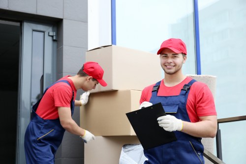Removal team managing access in a Greenwich apartment move