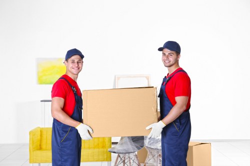 Moving team loading furniture for a Greenwich property relocation
