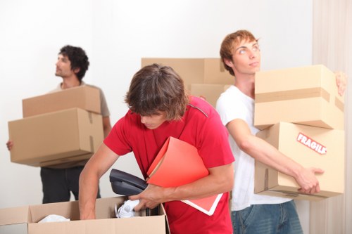 Local moving van helping customers with furniture transport in Greenwich