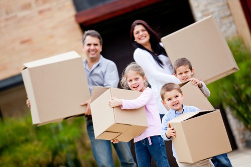 Movers navigating access challenges in a Greenwich residential street