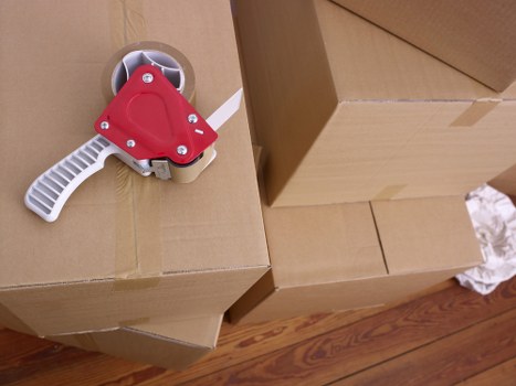 Packed office furniture and files prepared for a Greenwich move