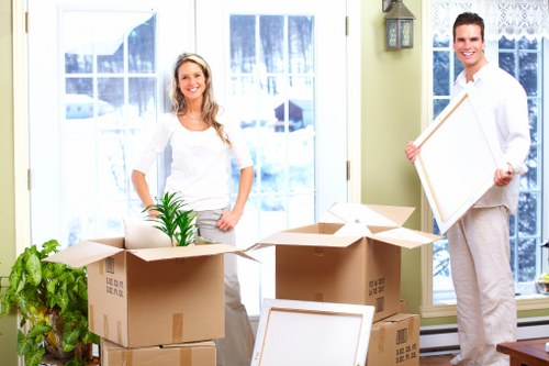 Unpacking boxes in a Greenwich property after moving day